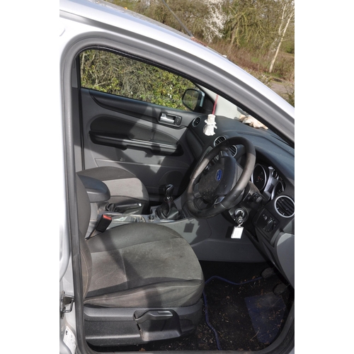 1002 - A 2010 FORD FOCUS ZETEC 100 5 door HATCHBACK in silver, first registered 23/07/2010 under number BN1... 