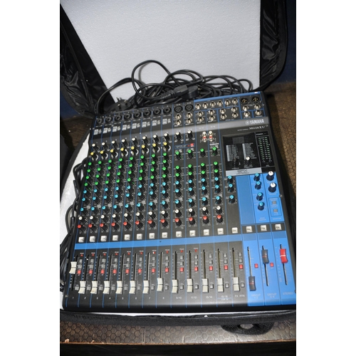 1053 - A YAMAHA MG16XU MIXING DESK with 8 mic inputs and four stereo channels, SPX effects, Cobra padded ca... 