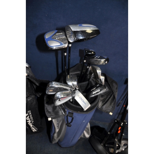 1056 - TWO GOLF BAGS CONTAINING DUNLOP AND DONNAY CLUBS including thirteen irons, seven drivers and two put... 