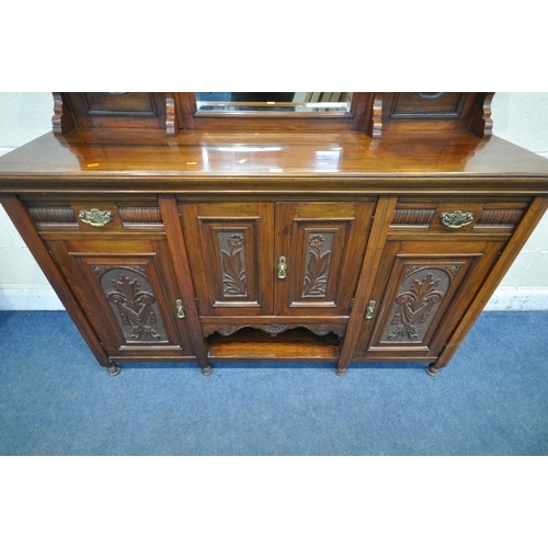 1332 - AN EDWARDIAN MAHOGANY MIRROR BACK SIDEBOARD, the top with three bevelled mirror plates, scrolled and... 