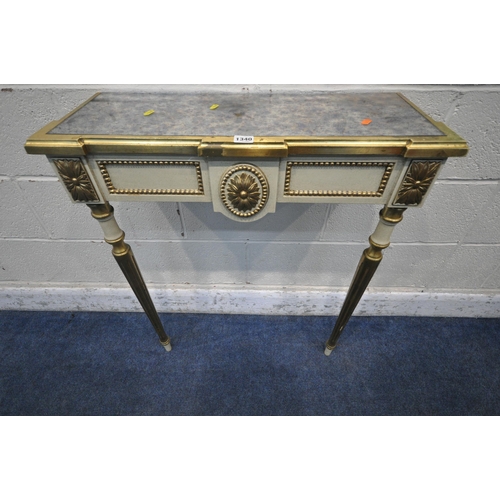 1340 - A FRENCH STYLE CREAM AND GILT CONSOLE TABLE, with a reflective insert, foliate decoration, on cylind... 