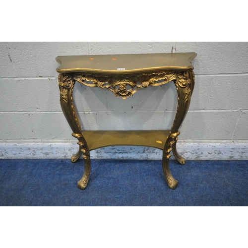 1341 - AN ITALIAN STYLE GILT CONSOLE TABLE, with shaped top, scrolled and foliate decoration, on cabriole s... 