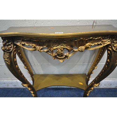 1341 - AN ITALIAN STYLE GILT CONSOLE TABLE, with shaped top, scrolled and foliate decoration, on cabriole s... 