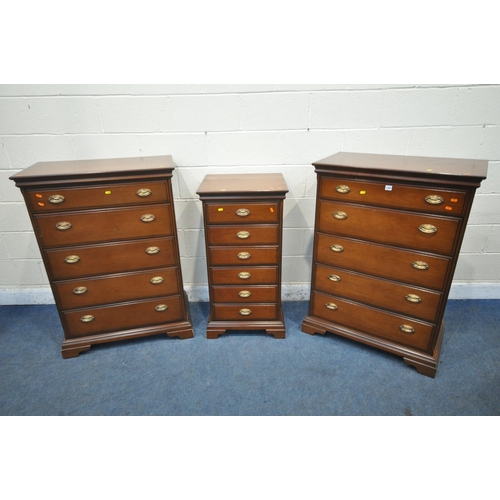 1347 - A PAIR OF STAG MAHOGANY CHESTS OF FIVE DRAWERS, width 82cm x depth 46cm x height 116cm, along with a... 