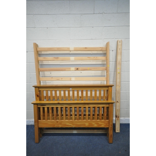 1350 - A JULIAN BOWEN PINE 4FT6 BEDSTEAD, with side rails, slats, central support and a bag of bolts (condi... 