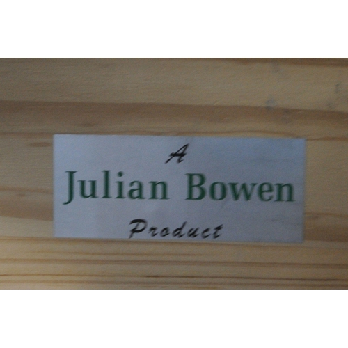 1350 - A JULIAN BOWEN PINE 4FT6 BEDSTEAD, with side rails, slats, central support and a bag of bolts (condi... 