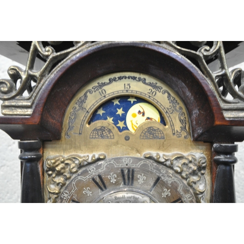 1353 - A WARMINK WUBA STYLE DUTCH WALL CLOCK, the arched top with three finials, above scrolled details, th... 