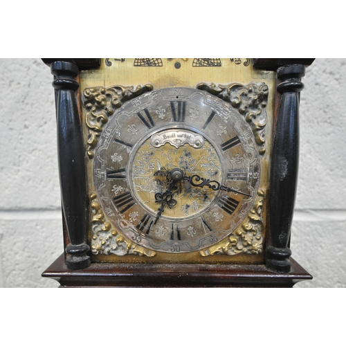 1353 - A WARMINK WUBA STYLE DUTCH WALL CLOCK, the arched top with three finials, above scrolled details, th... 