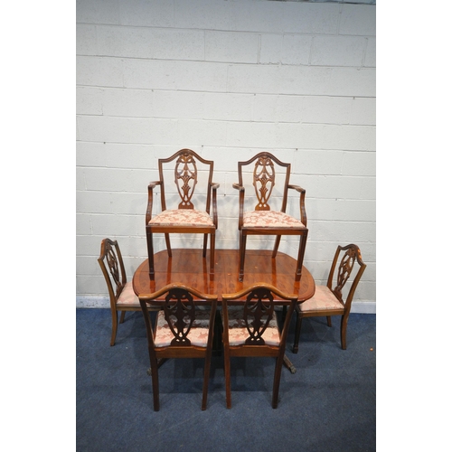 1357 - A 20TH CENTURY MAHOGANY OVAL EXTENDING DINING TABLE, with one fold out leaf, length 145cm x depth 94... 