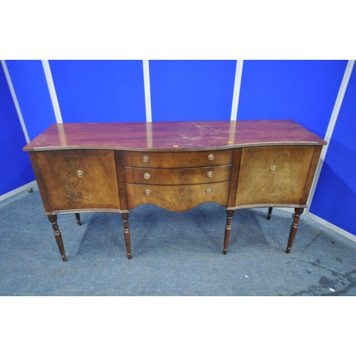 1357 - A 20TH CENTURY MAHOGANY OVAL EXTENDING DINING TABLE, with one fold out leaf, length 145cm x depth 94... 