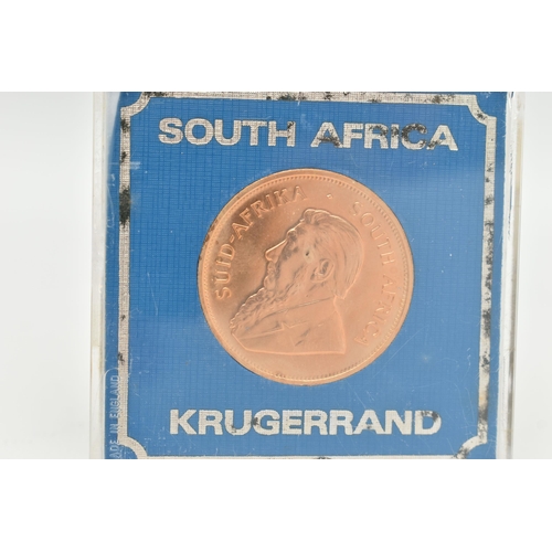 21 - A GOLD SOUTH AFRICA 1980 1OZ KRUGERRAND COIN, displayed in a Barclays Bank capsule