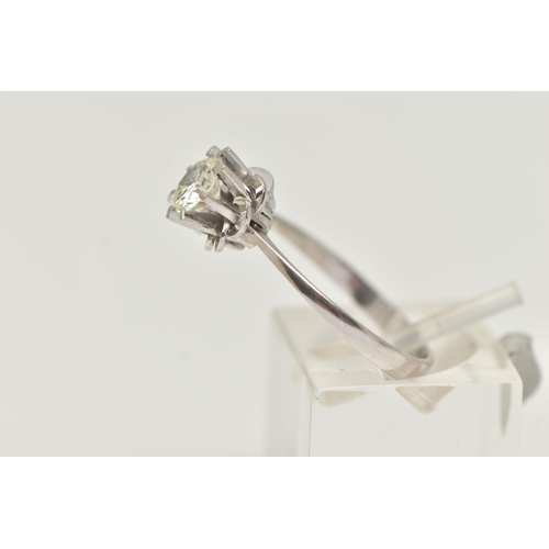 41 - A SINGLE STONE DIAMOND RING, the brilliant cut diamond in an eight claw setting with fancy looped de... 