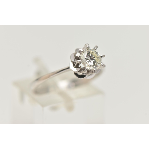 41 - A SINGLE STONE DIAMOND RING, the brilliant cut diamond in an eight claw setting with fancy looped de... 