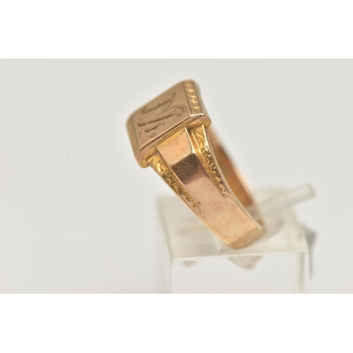 61 - A GENTS 9CT GOLD SIGNET RING, engraved square signet with Greek key pattern, foliate pattern to the ... 