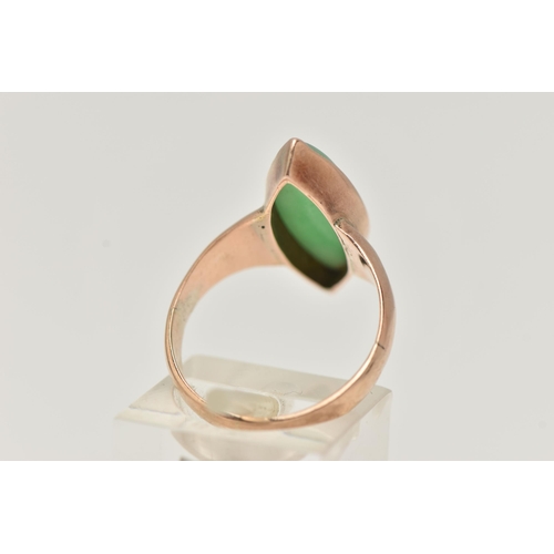 68 - A ROSE METAL JADE DRESS RING, marquise jade cabochon, in a milgrain collet setting, measuring approx... 