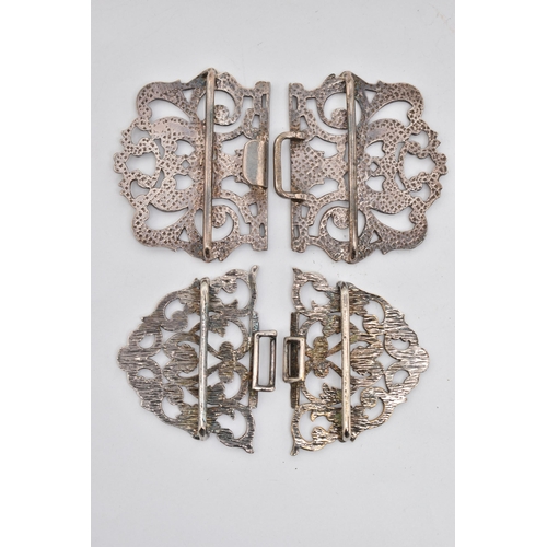 104 - TWO SILVER NURSES BELT BUCKLES, the first of an open work scrolling design, hallmarked 'P M Ltd' Bir... 