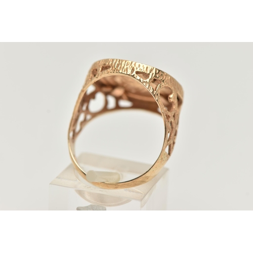 105 - A KRUGERRAND RING, a 1981 Krugerrand 1/10 coin, mounted in a textured open work ring mount, ring siz... 