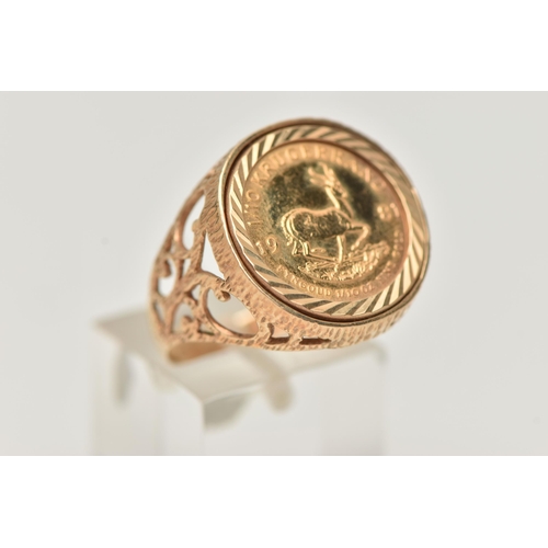 105 - A KRUGERRAND RING, a 1981 Krugerrand 1/10 coin, mounted in a textured open work ring mount, ring siz... 