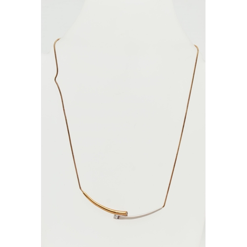 115 - A 9CT GOLD 'ROYAL MINT' 'CONNECTIONS COLLARETTE' NECKLACE, a bicolor bypass style necklace, flush se... 