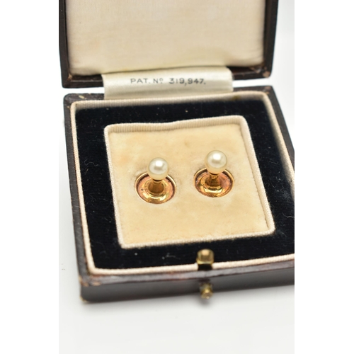 116 - A PAIR OF YELLOW METAL AND CULTURED PEARL DRESS STUDS, each fitted with a white cultured pearl, appr... 