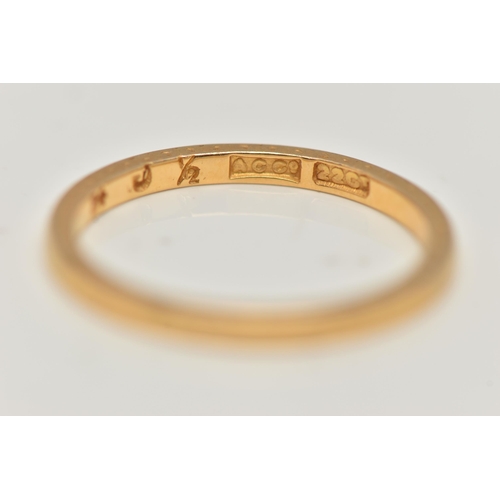 118 - A YELLOW METAL BAND RING, a thin band ring with patterned side profiles, approximate width 1.5mm x d... 