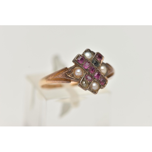 122 - A 15CT GOLD VICTORIAN GEM SET RING, designed as a cross set with predominantly oval cut rubies, four... 