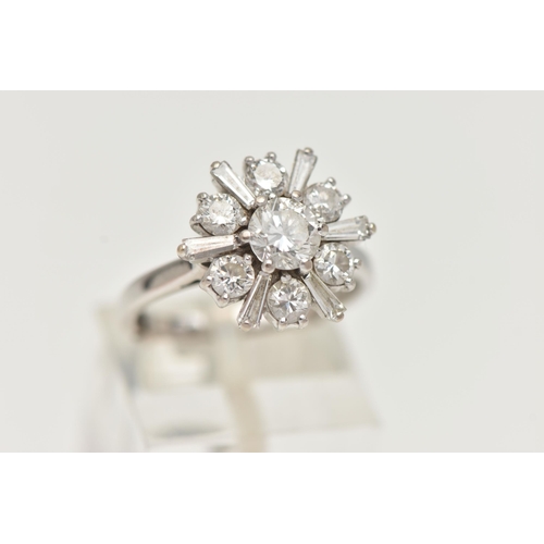 124 - AN 18CT WHITE GOLD DIAMOND CLUSTER RING, centering on a round brilliant cut diamond, estimated diamo... 