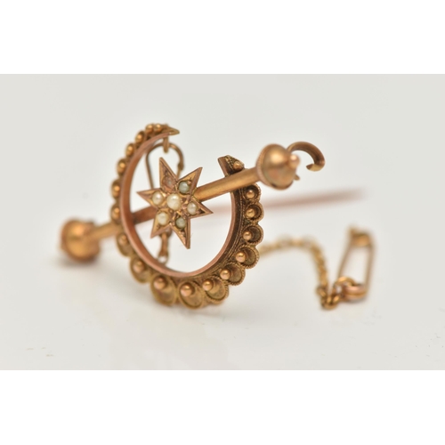 78 - A VICTORIAN 9CT GOLD BROOCH, designed as a cannetille crescent moon and split pearl set star (one pe... 