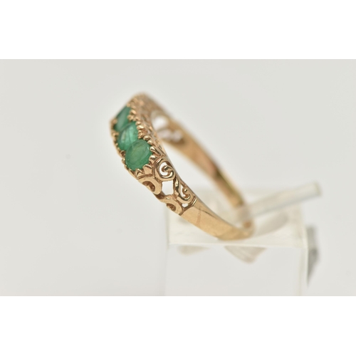 81 - A 9CT GOLD FIVE STONE EMERALD RING, five circular cut emeralds, each claw set, scrolling gallery and... 