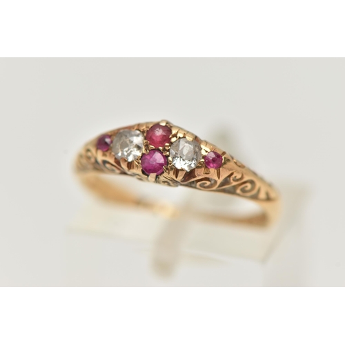 83 - AN EARLY 20TH CENTURY, 18CT GOLD RUBY AND DIAMOND RING, set with two old cut diamonds and four small... 