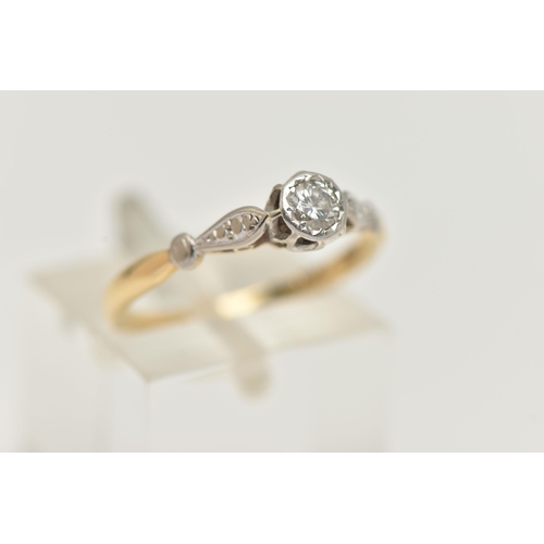 85 - A YELLOW AND WHITE METAL DIAMOND SINGLE STONE RING, illusion set round brilliant cut diamond, estima... 