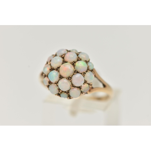 86 - A 9CT GOLD OPAL CABOCHON DOME RING, circular dome set with circular cut opal cabochons, approximate ... 