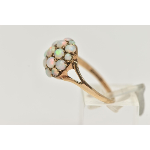 86 - A 9CT GOLD OPAL CABOCHON DOME RING, circular dome set with circular cut opal cabochons, approximate ... 