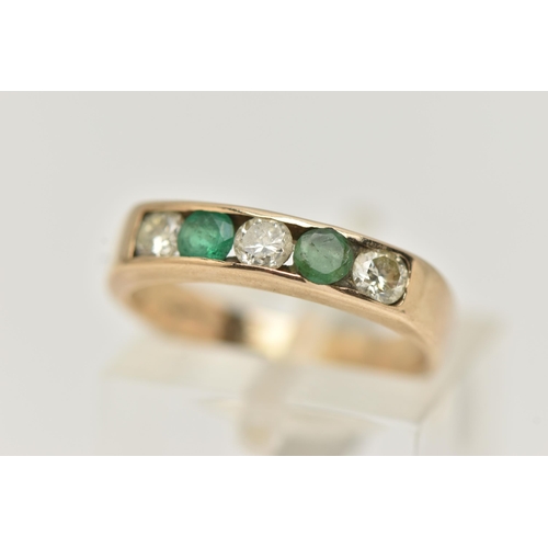 89 - A 9CT GOLD EMERALD AND DIAMOND HALF ETERNITY RING, set with three round brilliant cut diamonds, esti... 