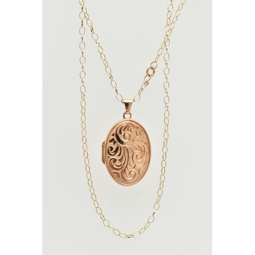 92 - A 9CT GOLD LOCKET PENDANT AND CHAIN, oval floral pattern locket, opens to reveal two vacant compartm... 