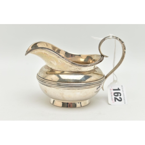 162 - A LATE VICTORIAN CREAM JUG, baluster silver cream jug with acanthus detail to the scrolled handle, a... 