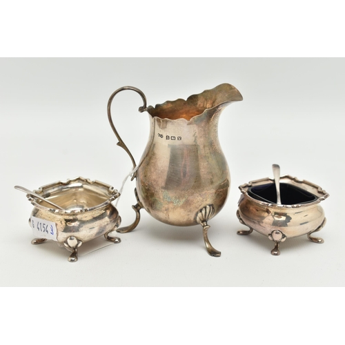 181 - THREE ITEMS OF EARLY 20TH CENTURY SILVERWARE, to include a cream jug with scalloped edging, scrollin... 