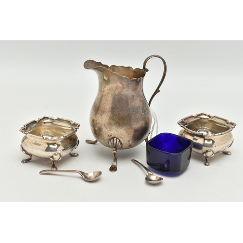 181 - THREE ITEMS OF EARLY 20TH CENTURY SILVERWARE, to include a cream jug with scalloped edging, scrollin... 