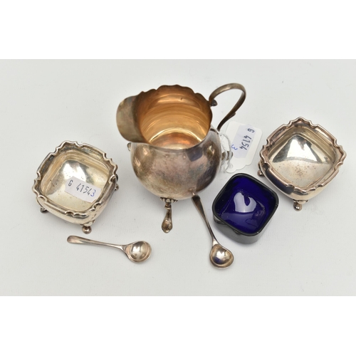 181 - THREE ITEMS OF EARLY 20TH CENTURY SILVERWARE, to include a cream jug with scalloped edging, scrollin... 