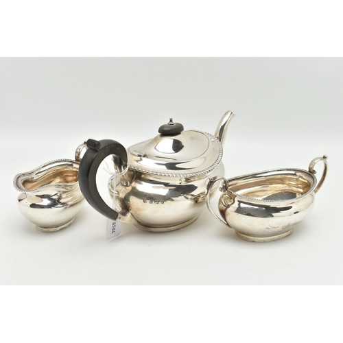 184 - A MID 20TH CENTURY, THREE PIECE SILVER TEA SET, comprising of a teapot, fitted with an ebonised hand... 