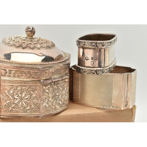 186 - SEVEN SILVER NAPKIN RINGS AND AN INDIAN TRINKET BOX, to include a set of four engine turned napkin r... 