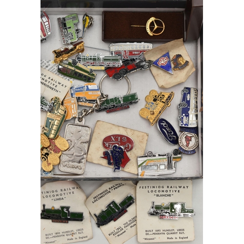 191 - ASSORTED TRANSPORT PINS AND BADGES, to include buses, railway, haulage and RAC, together with two dr... 