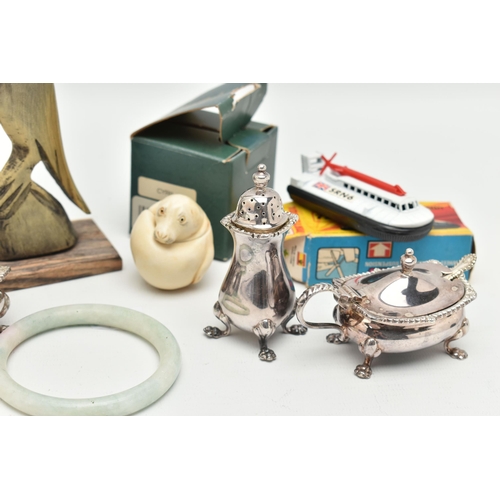 192 - A SELECTION OF MISCELLANEOUS ITEMS, to include an EPNS cruet set, a torque bangle set with an oval l... 