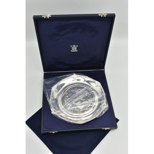 210 - A CASED 'ROYAL MINT' WATERLOO SILVER SALVER, depicting a battle of Waterloo scene, with the Arms of ... 