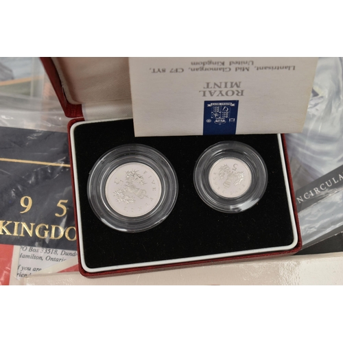 212 - A RED BOX OF ROYAL MINT SILVER AND SILVER PROOF COINS TO INCLUDE 17 BRITANNIA COINS (Some with Marks... 