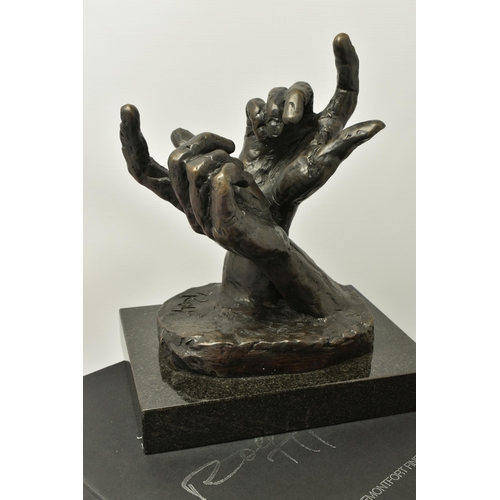 325 - ROLF HARRIS (AUSTRALIAN 1931) 'INTUITION' a limited edition bronze sculpture of a pair of hands 235/... 