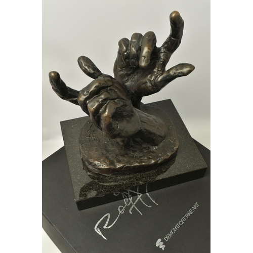 325 - ROLF HARRIS (AUSTRALIAN 1931) 'INTUITION' a limited edition bronze sculpture of a pair of hands 235/... 