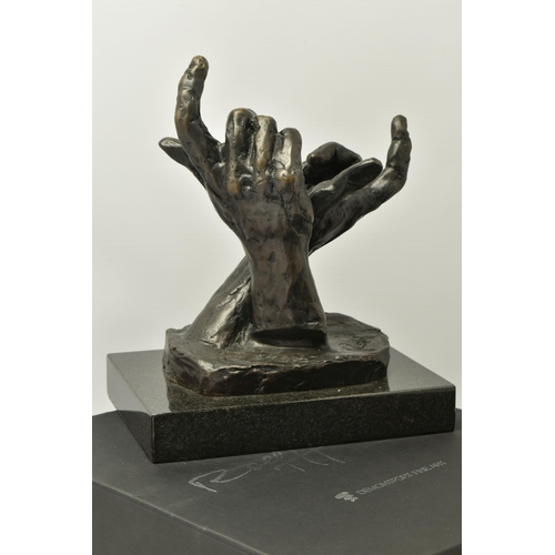 325 - ROLF HARRIS (AUSTRALIAN 1931) 'INTUITION' a limited edition bronze sculpture of a pair of hands 235/... 