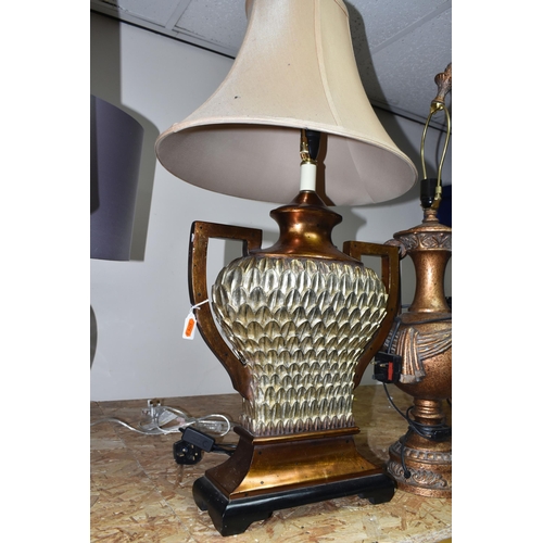 327 - THREE BRONZED TABLE LAMPS, comprising a pair of bronzed urn style lamps missing shades, height 80cm ... 