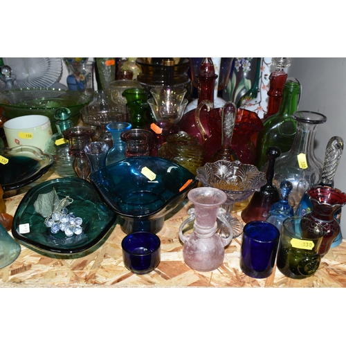 330 - A LARGE QUANTITY OF COLOURED AND STUDIO GLASS, comprising a Mary Gregory blue glass beaker, mid- cen... 